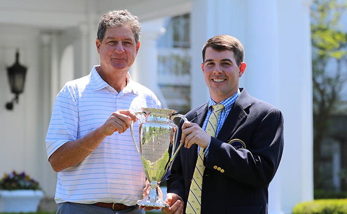 MGA staff member handing trophy to winner of 91st MGA Senior Amateur Championship at Old Oaks Country Club