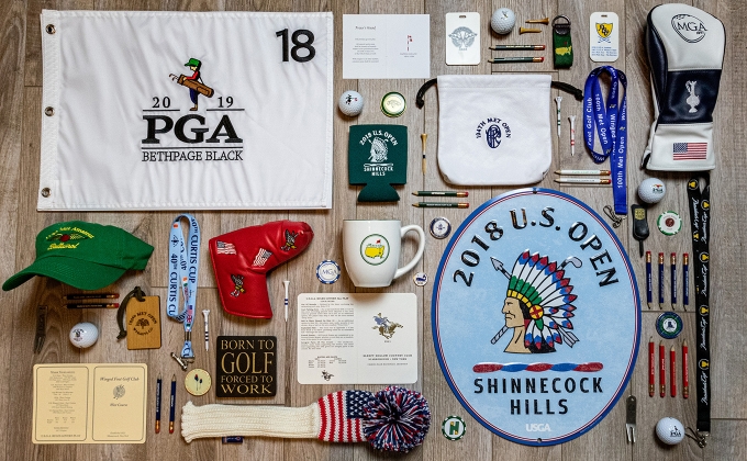 Various golf items, flag, tees, ball markers, mug, signs, scorecards, pencils